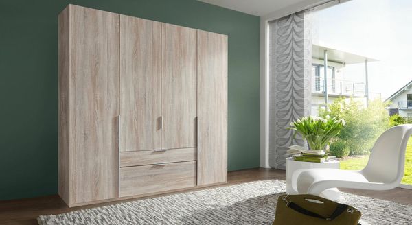 Drehtüren-Kleiderschrank Coreno Eiche Dekor mit Schubladen