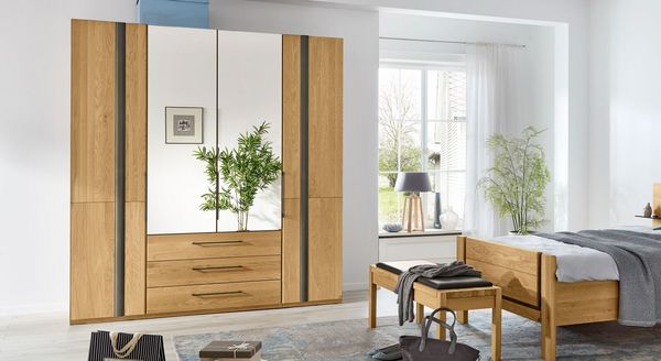 Musterring Falttüren-Kleiderschrank Sorrent Eiche teilmassiv mit Schubladen und Spiegel